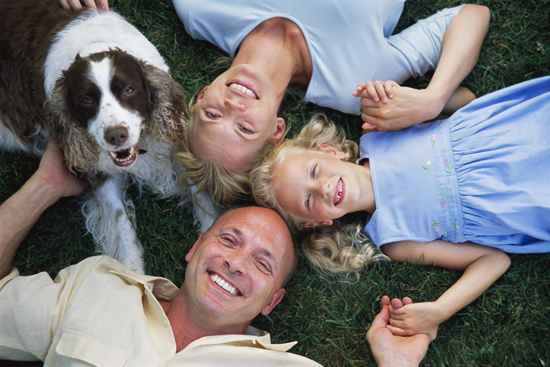 Family Lying on Grass
